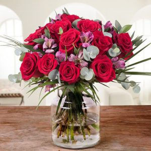 Fantastic Red roses in a square vase from JuneFlowers.com