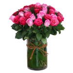 Lavish Pink Roses in Cylinder JuneFlowers.com