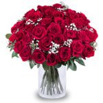 Romance of red roses in a cylindrical vase from JuneFlowers.com