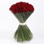 Beautiful Red roses with steel grass from JuneFlowers.com