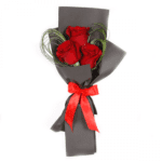 Fantastic Red roses in a black wrapping sheet from JuneFlowers.com