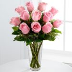 Exotic pink rose in a vase from JuneFlowers.com