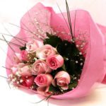 stunning bouquet of assorted 12 Pink Roses from JuneFlowers.com