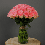 pink rose in glass vase